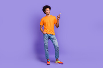 Fototapeta premium Full body size photo of confident marketing promo manager hipster guy funny hair direct finger mockup isolated on violet color background
