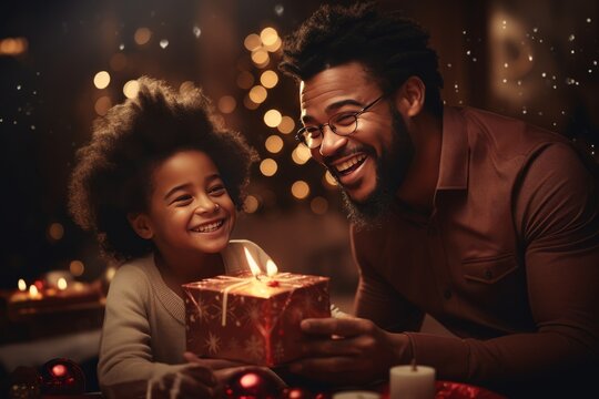 Happy Fathers day. African american kid son giving gift box to dad for holiday at home, Concept of love in family