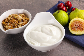 Fototapeta na wymiar Traditional homemade Greek yoghurt with granola