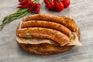 Raw sausages with spices and herbs