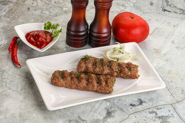 Kebab with beef served onion