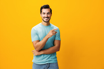 Fashion man space portrait background trendy copy confident lifestyle laughing yellow smiling style arm studio gesture