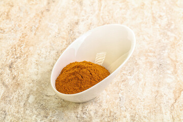 Dry Paprika powder in the bowl