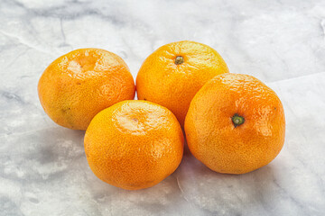 Fresh ripe juicy yellow mandarin