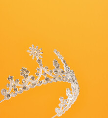 Delightful, beautiful tiara with lots of sparkling stones. An exclusive piece of jewelry. Copy space for text. © Dima