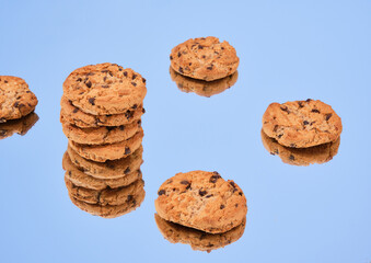 Fresh oatmeal cookies with chocolate chunks on the mirror. Breakfast or a sweet snack.