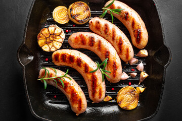 Grilled sausages with vegetables and rosemary