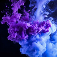 Fototapeta premium Purple and blue ink in water on a black background. Abstract background.