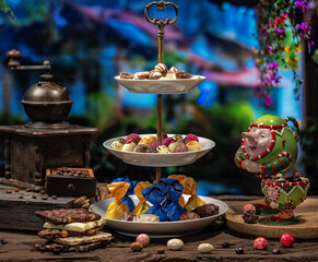 Unusual presentation of chocolate in fairy tale style. Unusual background and interior.
