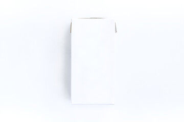 Carton of milk or juice package on gray background, White carton box 