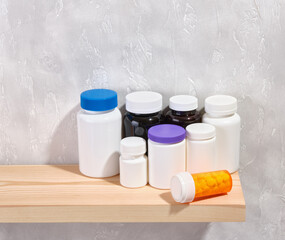 Healthy lifestyle concept. Various medical jars with pills and supplements. Copy space for text.