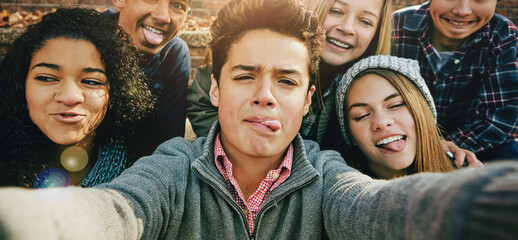Teenage, friends or group selfie in autumn or social media joy, diversity or outdoor community bonding. Girls, male person or portrait fun face memory in park joy picture, clothes or profile picture