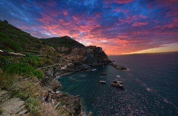 Beautiful sunset in  Manarola a popular fishing village and a  tourist destination in Cinque Terre in Italy