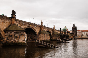 Amazing autumn view on the Charles Bridge and Vltava river 