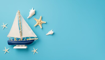 Top view of ship, sailboat toy with starfishes on blue background with copy space