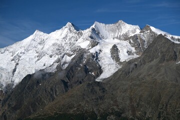 Fototapeta na wymiar peaks in the mountains with glaciers in Switzerland, Dom,