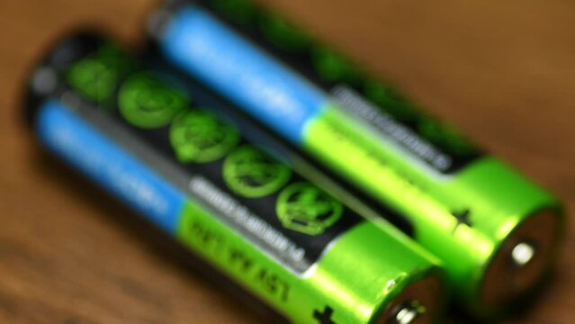 AA batteries macro close up focus on blur background