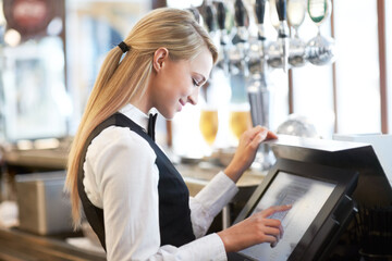 Cashier, barista and young woman waitress in cafe checking for payment receipt. Hospitality, server and female butler from Canada preparing a slip at the till by a bar in coffee shop or restaurant. - obrazy, fototapety, plakaty