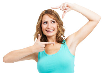 Happy, woman and finger frame in studio to review profile picture on white background. Model, smile and thinking of perspective for photography ideas, planning selfie and hand sign to border face