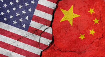 US and Chinese flags, concrete wall texture with cracks, grunge background, military conflict concept