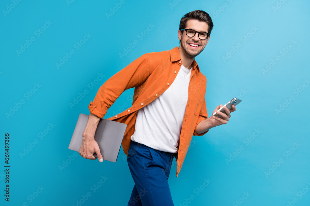 Poster profile portrait of cheerful successful executive director walk hold netbook use smart phone isolate