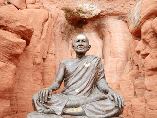 Fototapeta na wymiar statue of buddha, Buddha statue at the ancient temple, peaceful image of a Buddha statue, ancient buddha statues south east asia