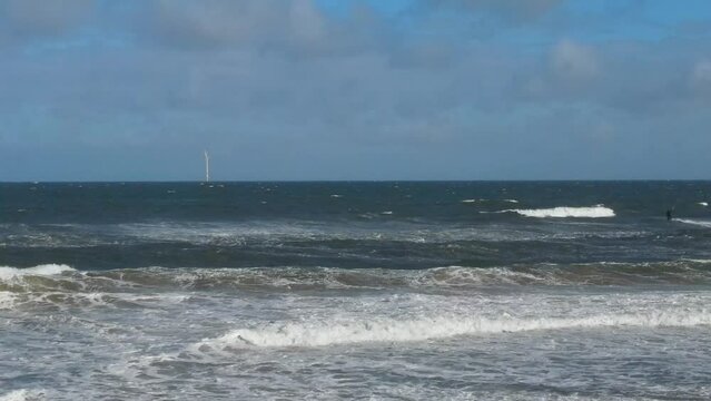 High Angle Footage of Kite surfing over Beach and Ocean of Northumberland England UK. The Footage Was Captured with Drone's Camera on Jan 24th, 2021