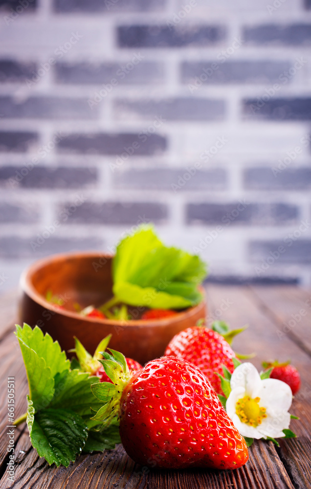 Sticker fresh ripe organic strawberry on wooden table