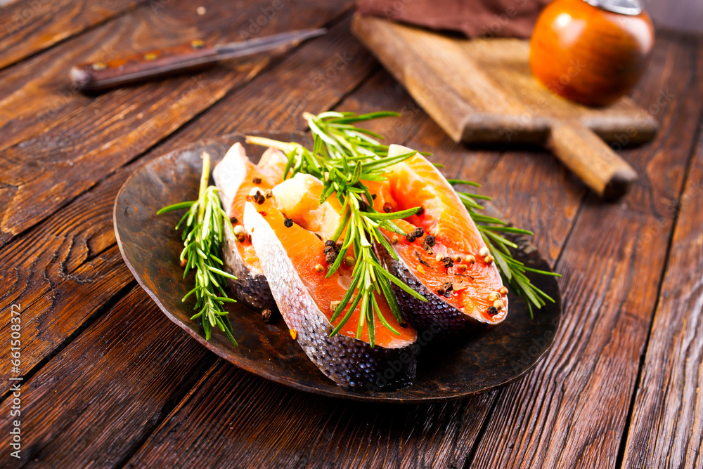 Wall mural Delicious cooked salmon fish fillets on plate