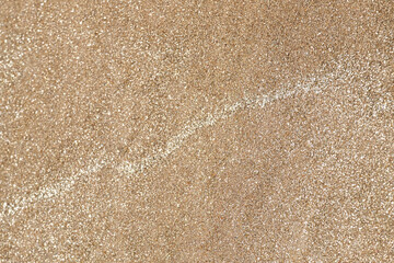 golden sand background with silver stripe