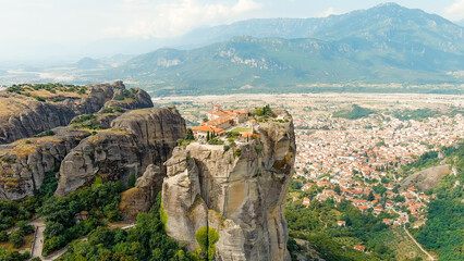 Fototapeta na wymiar Meteora, Kalabaka, Greece. Monastery of the Holy Trinity at Meteora. Meteora - rocks, up to 600 meters high. There are 6 active Greek Orthodox monasteries listed on the UNESCO list, Aerial View