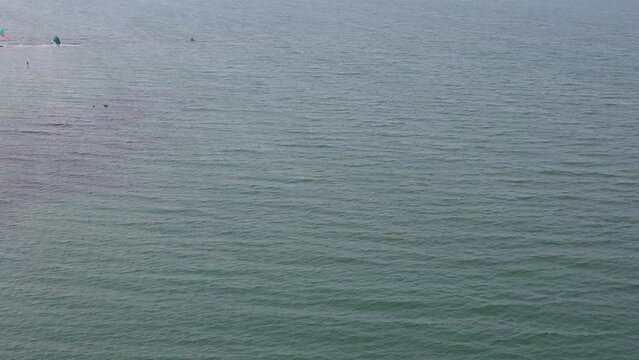 High Angle Footage of Kite surfing over Beach and Ocean of Northumberland England UK. The Footage Was Captured with Drone's Camera on Jan 24th, 2021