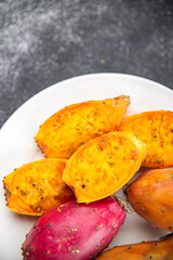prickly pear exotic fresh fruit figues de barbarie tasty appetizer meal food snack on the table copy space
