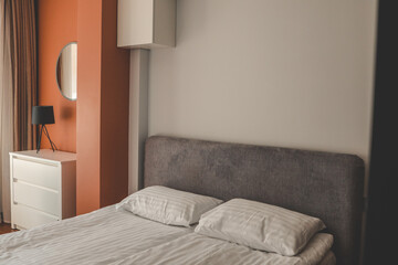 Stylish fashionable bedroom interior, bed