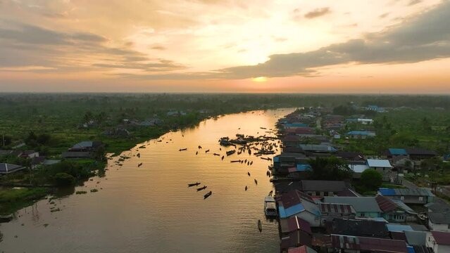 Floating market activities in Lok Baintan, South Kalimantan shot from drone