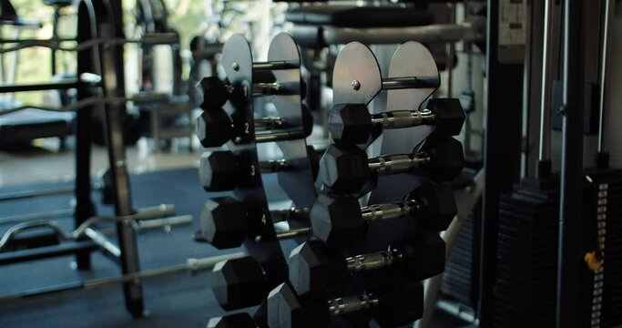 Close-Up of Dumbbell Lying on Rack in Gym Sports Equipment Concept for Effective Workouts