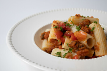 Traditional Italian pasta, Rigatoni Pomodoro , Rigatoni pasta with tomato sauce