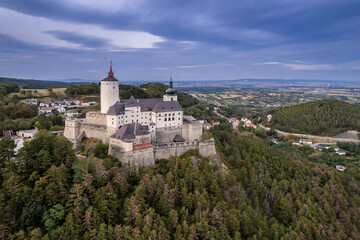 Fototapeta na wymiar The medieval Forchtenstein Castle on the hilltop, surrounded by dense forest in Burgenland, Austria.
