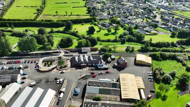 Aerial video of Joey's Bar Public House Joey Dunlop Robert Dunlop and Ballymoney Train Station Co Antrim Northern Ireland 10-10-23
