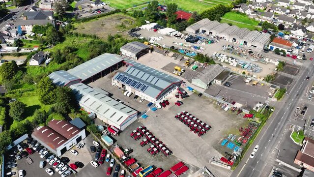 Aerial video of John McElderry Motors & Tractors LTD Steele Farm Supplies O Harrigans Garage Rudi Gage Car Sales Ballymoney Town Co Antrim Northern Ireland 