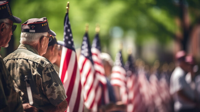A group of veterans saluting the flag during a Memorial Day parade, with copy space, blurred background