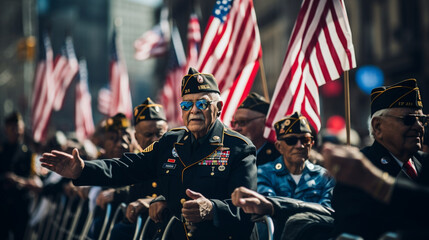 Veterans in a parade, waving to the crowd, blurred background