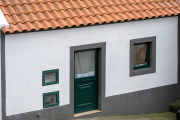House window and door in Ponta Delgada on the Island of Sao Miguel in the Azores