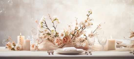 Elegant white wedding table adorned with flowers candles and dishes With copyspace for text