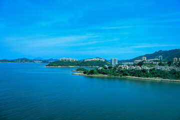 Fototapeta na wymiar The view of Hong Kong rural scene with calm seascape at sunny day. Travel and nature scene.