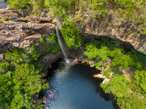 Aerial view of the scenic waterfall Chorro San Luis embedded in a thick, tropical forest near Robor&eacute; in the lowlands of Bolivia - Traveling and exploring South America