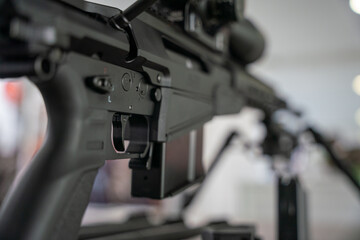 sniper rifle trigger and magazine - obrazy, fototapety, plakaty