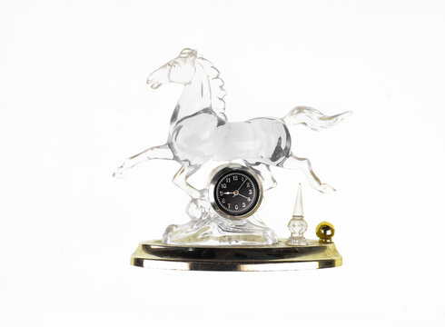 Glass Horse With Clock Isolated On White Background