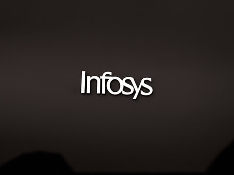 October 13th 2023 India, the white logo of Infosys on a black wall.  Infosys' emblem on a dark store.