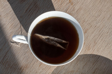 cup of tea on wooden table